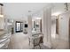 Bright living area with tile flooring, decorative columns, and comfortable seating arrangement at 272 14Th St # 23, Atlanta, GA 30309