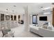 Open living space with tile flooring, breakfast bar, and modern furnishings at 272 14Th St # 23, Atlanta, GA 30309