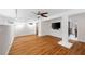 Inviting living room with a ceiling fan, hardwood floors, and a wall-mounted TV for entertainment at 272 14Th St # 23, Atlanta, GA 30309