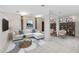Contemporary living space with tile floors, white couch, and decorative bookshelves at 272 14Th St # 23, Atlanta, GA 30309