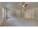 Vast bedroom featuring carpet, ceiling fan, and tray ceiling at 2780 Dolce Rd, Dacula, GA 30019