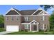 Charming two-story brick home with a landscaped yard and attached two-car garage at 2780 Dolce Rd, Dacula, GA 30019