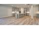 Gourmet kitchen features gray cabinetry, quartz countertops, stainless steel appliances, and an island at 2780 Dolce Rd, Dacula, GA 30019