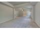 Large main bedroom with carpet, tray ceiling, and neutral color palette at 2780 Dolce Rd, Dacula, GA 30019