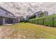 Spacious fenced backyard with patio, ideal for entertaining and outdoor activities at 2910 Hampton Grove Trce, Dacula, GA 30019