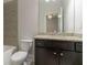 Bathroom featuring vanity with granite countertop and tile flooring at 2910 Hampton Grove Trce, Dacula, GA 30019