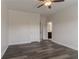 Bedroom with hardwood floors and entry to connected bathroom at 2910 Hampton Grove Trce, Dacula, GA 30019