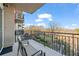 Balcony view of landscaped gardens with a metal railing at 2950 Mount Wilkinson Se Pkwy # 505, Atlanta, GA 30339