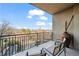 Inviting balcony with seating and panoramic views of the surrounding landscape at 2950 Mount Wilkinson Se Pkwy # 505, Atlanta, GA 30339