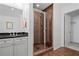 Bathroom featuring tile shower and granite countertops at 2950 Mount Wilkinson Se Pkwy # 505, Atlanta, GA 30339