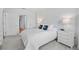 Clean bedroom with neutral colors, featuring an elegant bedside table and decor at 2950 Mount Wilkinson Se Pkwy # 505, Atlanta, GA 30339