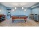 Game room featuring a billiard table, comfortable seating, and stylish lighting at 2950 Mount Wilkinson Se Pkwy # 505, Atlanta, GA 30339