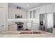 Modern kitchen with stainless steel appliances, granite countertops, and white cabinetry at 2950 Mount Wilkinson Se Pkwy # 505, Atlanta, GA 30339