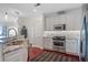 Bright kitchen with stainless steel appliances, granite countertops, and ample cabinet space at 2950 Mount Wilkinson Se Pkwy # 505, Atlanta, GA 30339