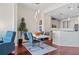 Open living space featuring dining area that flows into the modern kitchen at 2950 Mount Wilkinson Se Pkwy # 505, Atlanta, GA 30339