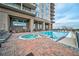 Beautiful pool area with lounge chairs and a hot tub at 2950 Mount Wilkinson Se Pkwy # 505, Atlanta, GA 30339