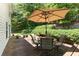 Spacious back deck with a covered dining area, perfect for outdoor entertaining and enjoying the landscaped backyard at 5404 Trumpet Vine Se Trl, Mableton, GA 30126