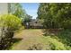 Spacious backyard with plenty of room for outdoor activities and a natural wooded border at 5404 Trumpet Vine Se Trl, Mableton, GA 30126