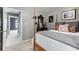 Comfortable bedroom featuring a four-poster bed, dresser, and decor at 5404 Trumpet Vine Se Trl, Mableton, GA 30126