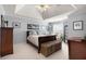 Tranquil main bedroom with vaulted ceiling, neutral colors, and dresser at 5404 Trumpet Vine Se Trl, Mableton, GA 30126
