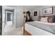 Bedroom featuring a bed and an open doorway to an upstairs hallway at 5404 Trumpet Vine Se Trl, Mableton, GA 30126