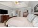 Comfortable bedroom featuring neutral tones, classic furnishings, and a calming atmosphere at 5404 Trumpet Vine Se Trl, Mableton, GA 30126