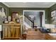 The home office has wainscoting, a large desk, and unique decor at 5404 Trumpet Vine Se Trl, Mableton, GA 30126