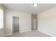 This bright bedroom offers a spacious closet with wire shelving and neutral walls at 5611 Meadowstone Walk, Kennesaw, GA 30152