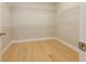 Spacious closet with bright, wood-look floor and wire shelving at 5611 Meadowstone Walk, Kennesaw, GA 30152