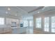 Modern kitchen with white cabinetry, stainless steel appliances, and large island at 5611 Meadowstone Walk, Kennesaw, GA 30152