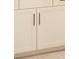 White mudroom cabinet features minimal hardware, shaker-style door and drawer fronts, and a stone countertop at 5611 Meadowstone Walk, Kennesaw, GA 30152