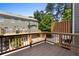 Outdoor deck with wood railing overlooking a backyard, providing a space for relaxation and entertainment at 1222 Lavista Ne Cir, Atlanta, GA 30324