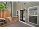 Outdoor deck with a view of the home's exterior, featuring access to the backyard, windows and an exterior light at 1222 Lavista Ne Cir, Atlanta, GA 30324