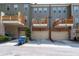Townhome exterior showing drive-under garages and balconies at 1222 Lavista Ne Cir, Atlanta, GA 30324