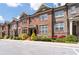Charming brick townhome with well-kept landscaping and inviting entrance at 1222 Lavista Ne Cir, Atlanta, GA 30324