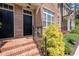 Inviting brick porch with black railing and freshly landscaped yard at 1222 Lavista Ne Cir, Atlanta, GA 30324
