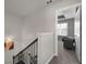 View of a carpeted hallway leading to a bedroom with ample sunlight at 1222 Lavista Ne Cir, Atlanta, GA 30324