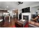 Spacious open-concept living area with hardwood floors, fireplace, and modern kitchen at 1222 Lavista Ne Cir, Atlanta, GA 30324
