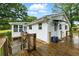 Inviting backyard deck is perfect for outdoor entertaining and relaxation at 1430 Mineral Springs Rd, Hoschton, GA 30548