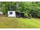 Outbuilding with storage space and open area at 1430 Mineral Springs Rd, Hoschton, GA 30548