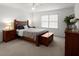 Bright bedroom with neutral tones, carpet, and a window at 2458 Zachary Woods Dr, Marietta, GA 30064