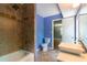 Stylish bathroom with walk-in shower and vessel sink at 2738 Westminister Nw Ln, Conyers, GA 30012