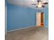 Inviting bedroom featuring carpet and a ceiling fan at 2738 Westminister Nw Ln, Conyers, GA 30012
