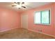 Comfortable bedroom with a window and closet at 2738 Westminister Nw Ln, Conyers, GA 30012