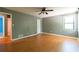 Bedroom featuring hardwood floors and natural light at 2738 Westminister Nw Ln, Conyers, GA 30012