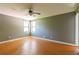 Bedroom with hardwood floors and natural light at 2738 Westminister Nw Ln, Conyers, GA 30012