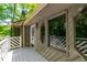 Private deck features unique architectural elements and views of the surrounding landscape at 2738 Westminister Nw Ln, Conyers, GA 30012