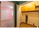 Hallway with view of a bedroom and storage at 2738 Westminister Nw Ln, Conyers, GA 30012