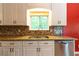 Kitchen with stainless steel dishwasher, granite countertops, and a tiled backsplash at 2738 Westminister Nw Ln, Conyers, GA 30012