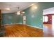 Large living room with hardwood floors and recessed lighting at 2738 Westminister Nw Ln, Conyers, GA 30012